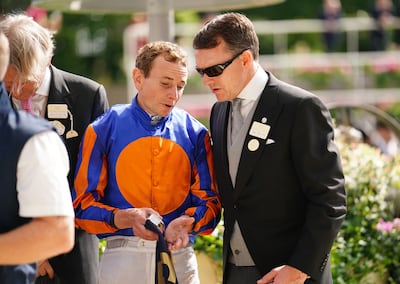 Jockey Ryan Moore with trainer Aidan O'Brien after winning The St James's Palace Stakes on Paddington on day one of Royal Ascot on Tuesday June 20, 2023. PA