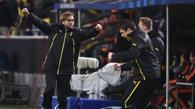 Jurgen Klopp, manager of Borussia Dortmund, celebrates the second goal scored by Marco Reus during Tuesday night’s Champions League match against Real Madrid. Lars Baron / Bongarts / Getty Images / April 8, 2014