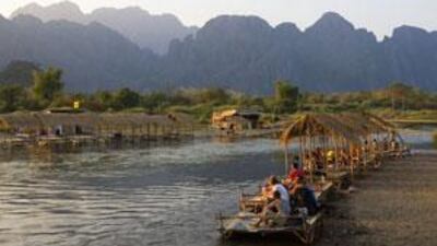 The mountains and valleys along the Nam Song river where rafting is a popular tourist activity.