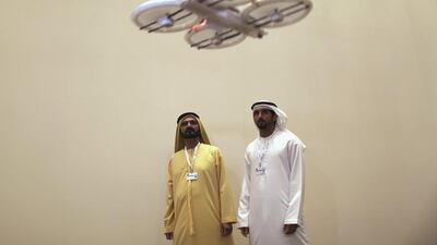 Sheikh Mohammed, the Vice-President and Ruler of Dubai, and his son Sheikh Hamdan, Crown Prince of Dubai, watch a drone during February’s Virtual Future exhibition. Students hope to develop their own drones. Ahmed Jadallah / Reuters