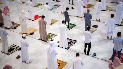 Worshippers perform Al Fajr prayer at the holy mosque in Makkah as it welcomes back public prayers for the first time in seven months. Saudi Arabia. REUTERS