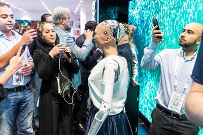 Sophia is mobbed by visitors at Gitex. Antonie Robertson / The National