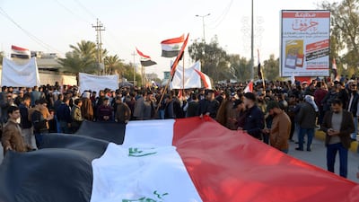 Iraqi followers of influential cleric Moqtada Sadr clash with anti-government protesters. AFP