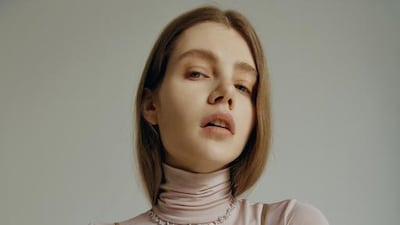 BRIGHT SPARK: Top, Dh2,480; trousers, Dh4,960, both from Fendi. Archi Dior necklace, price on request; Archi Dior ring, Dh60,000, both from Dior Fine Jewellery