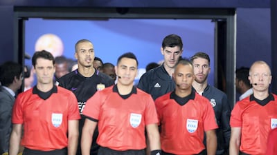 Ismail Ahmed (2nd L) capt of Al Ain and Sergio Ramos capt of Real Madrid (2nd R) before the match between Real Madrid and Al Ain at the Fifa Club World Cup final at the Zayed Sports City Stadium, Abu Dhabi. Chris Whiteoak / The National