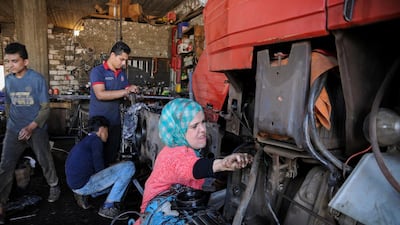 Ms Zanaty works at the garage in north-east Egypt. Reuters