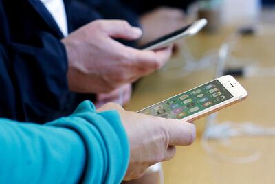 Try to live in the moment and be less dependent on your smartphone. AP photo