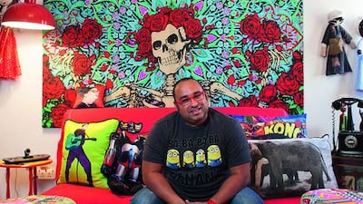 Tamer Khalifa sits in the design studio that he created in his Sharjah home. Clint McLean for The National