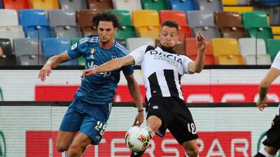 Juventus' Adrien Rabiot, left, and Udinense's Hidde Ter Avest clash. AP