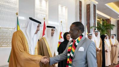 Khaldoon Al Mubarak, chief executive and managing director of Mubadala, chairman of the Abu Dhabi Executive Affairs Authority and Abu Dhabi Executive Council member, meets Emmerson Mnangagwa, President of Zimbabwe, during a reception at the Presidential Airport. Ryan Carter for the Ministry of Presidential Affairs