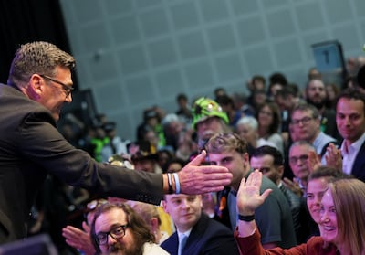 Newly elected Makerfield MP Andy Burnham greets a supporter after his by-election victory. Reuters