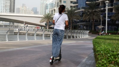 Dubai Police are seeking to address concerns over reckless e-scooter use by younger riders. Photo: The National