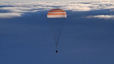 Russian Soyuz MS-06 space capsule carrying the International Space Station (ISS) crew of Russian cosmonaut Alexander Misurkin and NASA astronauts Mark Vande Hei and Joe Acaba prepares to land in a remote area south-east of the Kazakh town of Zhezkazgan, Kazakhstan. Alexander Nemenov / via AP