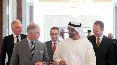 Sheikh Mohamed with the then Prince Charles in Abu Dhabi in 2014. Photo: Ryan Carter