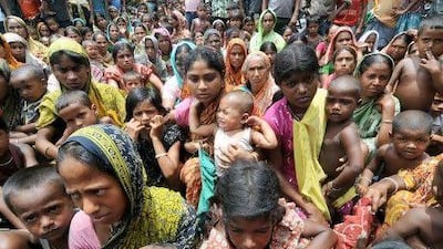 Displaced villagers wait at a relief camp at Bijni village in the Chirang district, some 240km from Guwahati, in India’s northeastern state of Assam. The camp is among nearly 60 hastily set up to cope with an estimated 200,000 refugees.