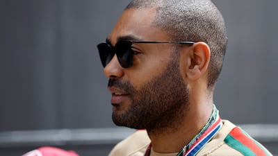 Music artist Kano is seen before the race. Reuters