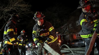 About 170 New York City firefighters worked in extreme cold to put out the fire and rescue about a dozen people from the building. Amr Alfiky / Reuters