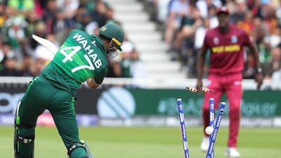 Pakistan's Wahab Riaz is bowled by West Indies' Oshane Thomas. AP Photo