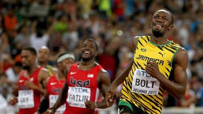 Usain Bolt smiles as he finishes first in the 100-metre final on Sunday at the 2015 Athletics World Championships in Beijing. Patrick Smith / Getty Images
