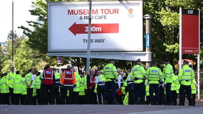 Police patrol outside after the game was abandoned with fans evacuated from the ground prior to the Premier League match between Manchester United and AFC Bournemouth at Old Trafford on May 15, 2016 in Manchester, England. (Alex Livesey/Getty Images)