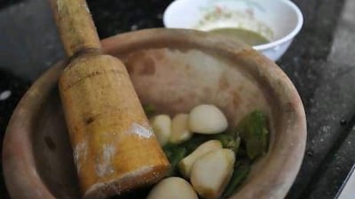 Handmade clay bowls, or zibdiyat, and accompanying lemon wood pestles are staples in the Gaza kitchen, used for everything from pounding garlic and chillies, to baking shrimp stews.