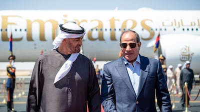 President Sheikh Mohamed and Egyptian President Abdel Fattah El Sisi at El Alamein airport. Abdulla Al Neyadi / UAE Presidential Court