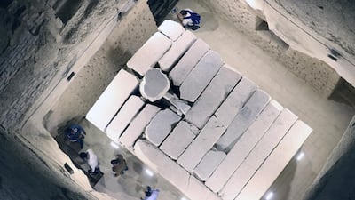 Tourists visit the Burial and Sarcophagus Chamber inside King Djoser's Step Pyramid. EPA