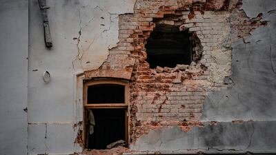 The partially damaged wall of the Sviatohirsk Cave Orthodox Christian Monastery, in the Ukrainian town of Svyatohirsk after the liberation of the area. AFP