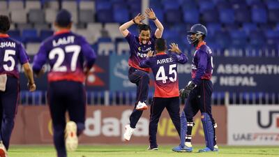 Nepal's Dipendra Singh Airee celebrates the fall of a West Indies wicket
