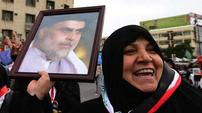 Supporters of Iraqi Shiite cleric Muqtada al-Sadr take part in a protest at the Al-Tahrir square in central Baghdad. EPA