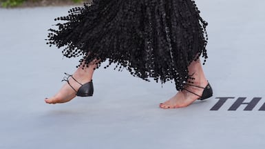 Margaret Qualley, wearing a pair of Chanel barefoot sandals, attends The Dog Stars world premiere at the Odeon Luxe, Leicester Square, London. Picture date: Thursday August 20, 2026. (Photo by Yui Mok/PA Images via Getty Images)