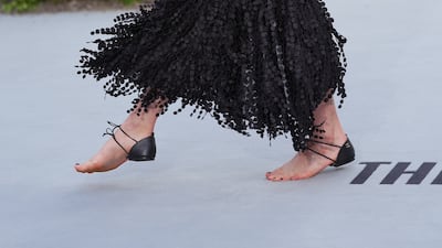 Margaret Qualley, wearing a pair of Chanel barefoot sandals, attends The Dog Stars world premiere at the Odeon Luxe, Leicester Square, London. Picture date: Thursday August 20, 2026. (Photo by Yui Mok/PA Images via Getty Images)