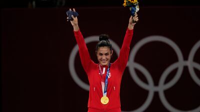 Gold medalist Serbia's Milica Mandić during the medal ceremony for taekwondo women's 67kg.