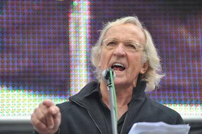 John Pilger addressing an anti-war demonstration marking the 10th anniversary of the Afghanistan war, in Trafalgar Square, London. PA
