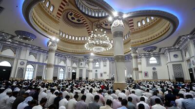 Early morning Eid prayers take place at Al Farooq Omar Bin Al Khattab Mosque in Dubai. Chris Whiteoak / The National