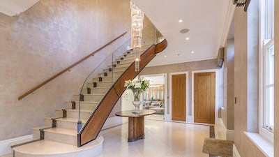 Sweeping staircases await the new owners. Courtesy Henry Wiltshire International
