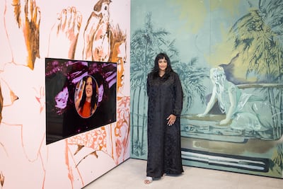 Almaha Jaralla with her installation for the Mutable Devotions exhibition. Photo: NYUAD
