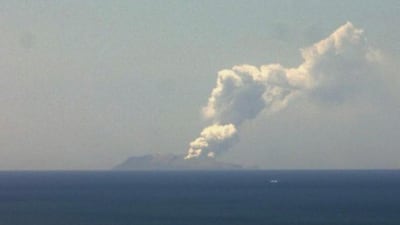A plume of ash rising from the Whakaari or White Island volcano on North Island, New Zealand. EPA / NEW ZEALAND INSTITUTE OF GEOLOGICAL AND NUCLEAR SCIENCES