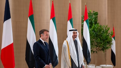 Sheikh Mohamed receives Mr Macron on arrival. UAE Presidential Court