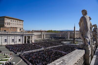 Tens of thousands of people gather in St Peter's Square. AP