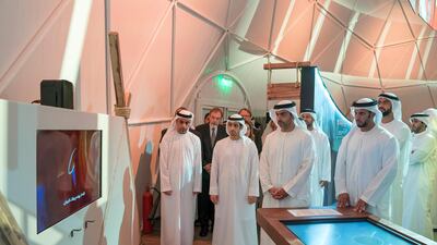 Sheikh Hamed bin Zayed, Chairman of the Crown Prince Court of Abu Dhabi and Abu Dhabi Executive Council Member (2nd R) and Sheikh Abdullah bin Mohammed, Chairman of Energy Authority and Abu Dhabi Executive Council Member (R), tour the exhibition which documents the UAE's longstanding commitment to disease eradication around the world. Seen with Nassar Al Mubarak, a Crown Prince Court of Abu Dhabi staff member (2nd L). Mohammed Al Hammadi / Crown Prince Court - Abu Dhabi