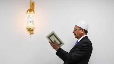 Abdul Ghaffar, Secretary of the Stornoway Mosque Trust, prepares the prayer room for the opening of the first mosque built on the Western Isles, Stornoway, Scotland, on May 11, 2018. Jeff J Mitchell / Getty Images