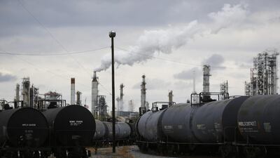 Railroad tanker cars sit outside the Paulsboro Refining Company in New Jersey. Declining US crude production provides more evidence that the market is rebalancing. Luke Sharrett / Bloomberg