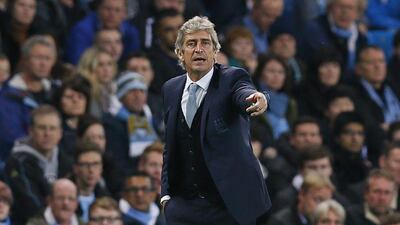 Manchester City manager Manuel Pellegrini directs his side during their Champions League match on Wednesday night against Sevilla. Jason Cairnduff / Action Images / Reuters