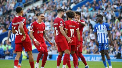 Mohamed Salah celebrates with Liverpool teammates after scoring the team's second goal. Getty