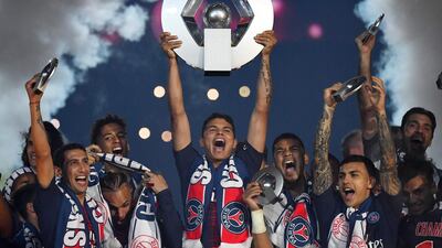 Thiago Silva lifts the Ligue 1 trophy after PSG had won the title in 2019. AFP