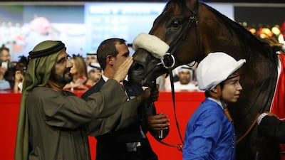 A new exhibition at Newmarket traces the history of Dubai and horse racing, and features many top moments in the sport for Sheikh Mohammed bin Rashid , Vice President of the UAE and Ruler of Dubai, left. Pawan Singh / The National