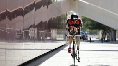 Para-athlete Sebastian Jensen trains for the Abu Dhabi triathlon. Chris Whiteoak / The National