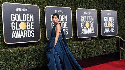 English actress Gemma Chan arrives for the ceremony. AFP