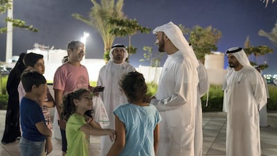 Sheikh Mohamed bin Zayed greets Abu Dhabi residents during his visit to the corniche. Mohammed Al Hammadi / Ministry of Presidential Affairs